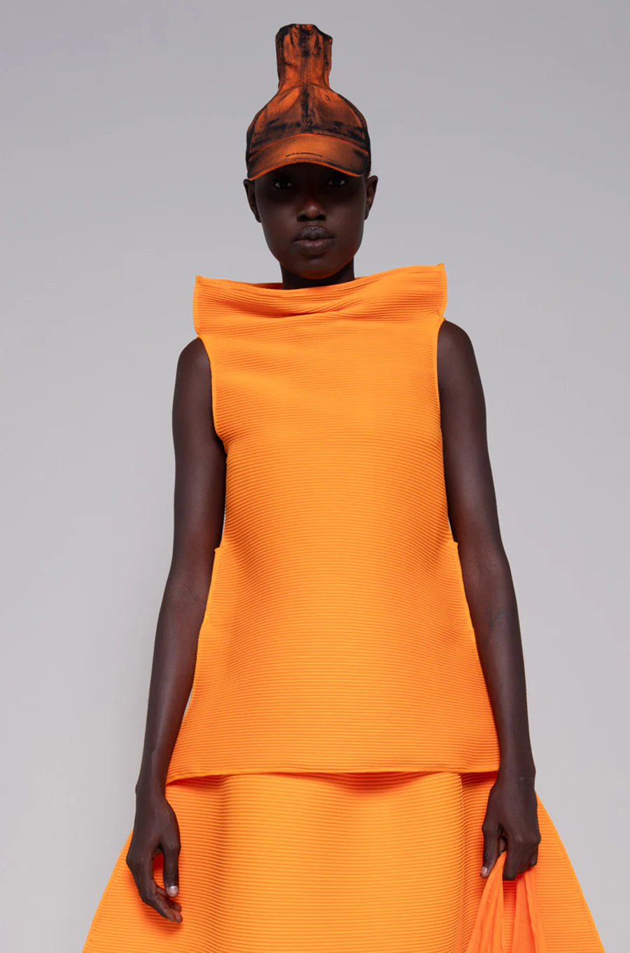 ORANGE SLEEVELESS RIPPLE TOP