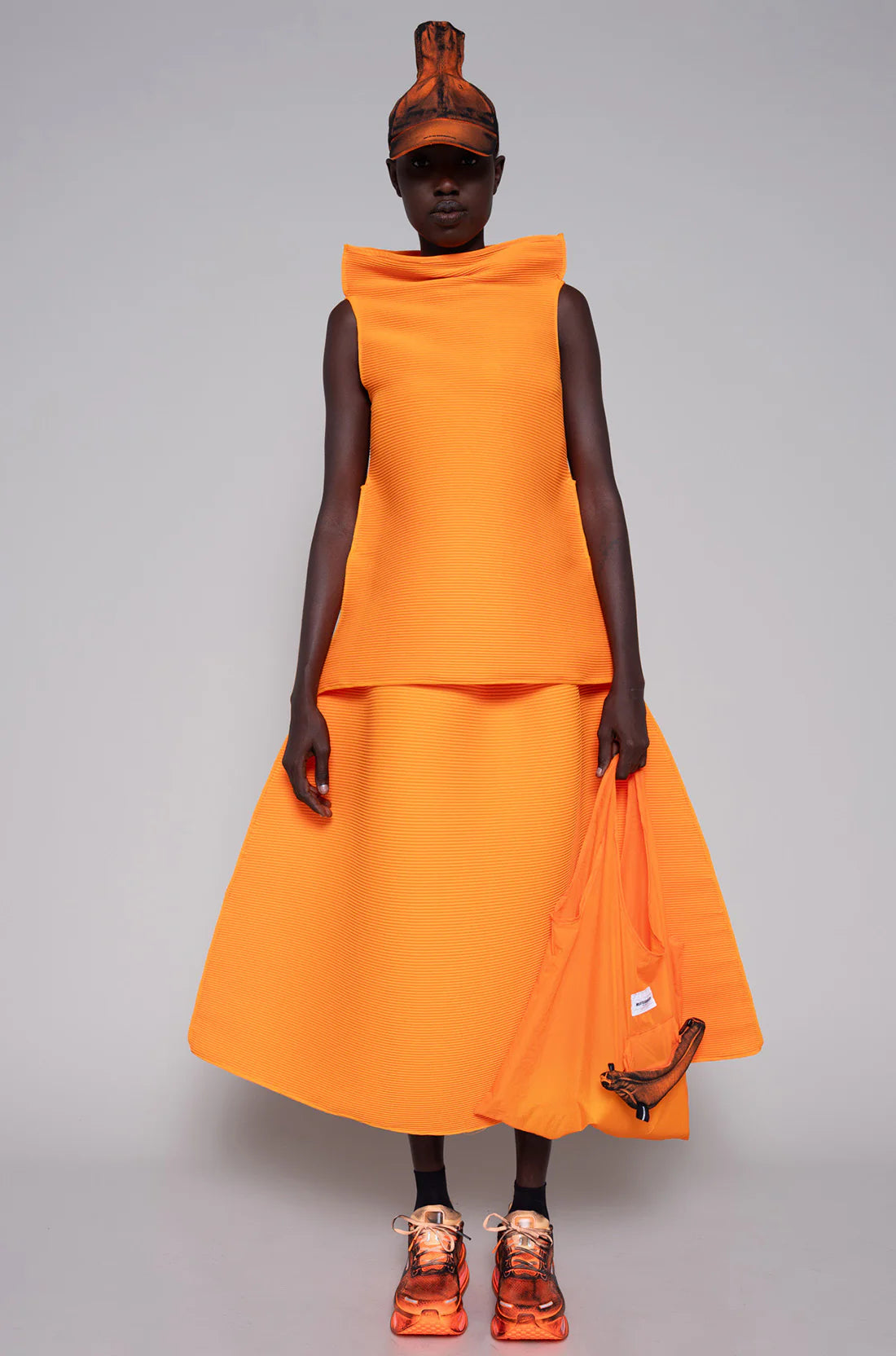 ORANGE SLEEVELESS RIPPLE TOP